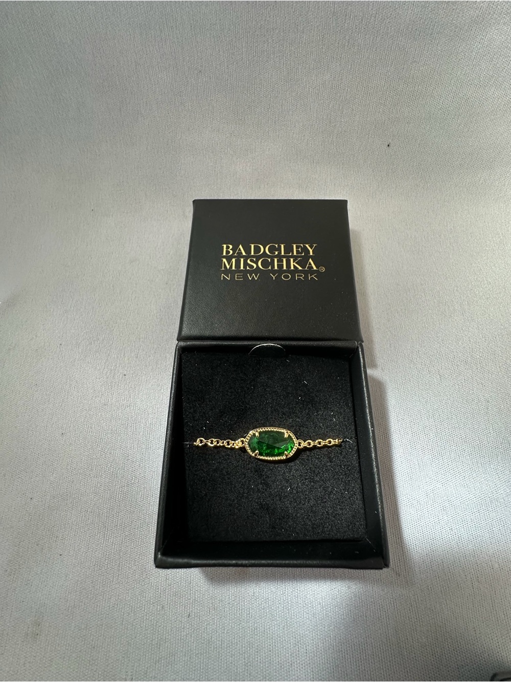 Badgley Mischka Gold Bracelet with Green Stone